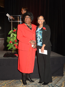 Mattie J. Eley Nursing Scholarship Recipient Catherine N. Hamilton (student at National American University) with Mrs. Mattie J. Eley giving her the award